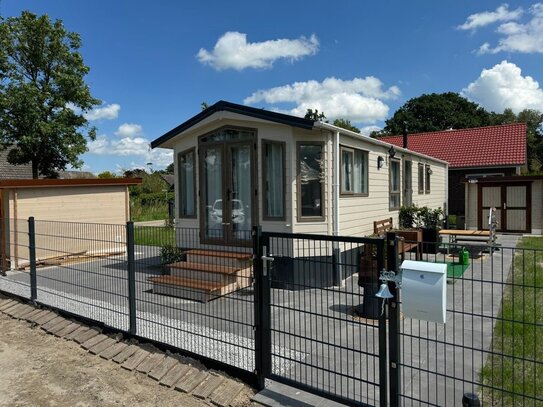 *Ihr Ferienhaus an der Nordsee* Neu gebautes Chalet auf schönem Grundstück am Deich des Jadebusens