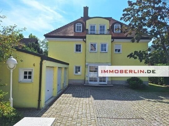 IMMOBERLIN.DE - Toplage! Feine Erdgeschosswohnung mit Südterrasse & -garten, Kamin & Pkw-Stellplatz