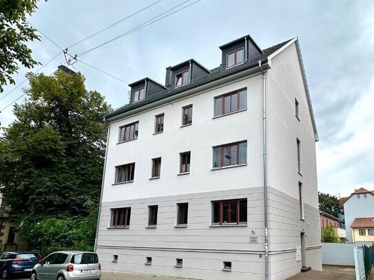 Stylisches 2 Raum Apartment zum Kauf in Top Lage mit offener Einbauküche, Balkon & PKW-Stellplatz