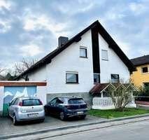 Vierfamilienhaus mit 6% Rendite mit Ausbaupotential in ruhiger Feldrandlage