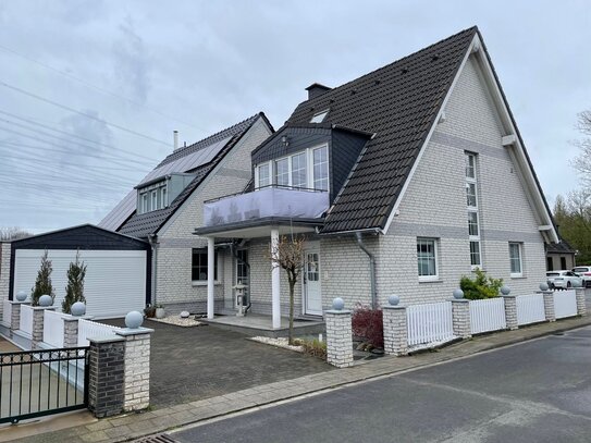 Vor den Toren Düsseldorfs - Einfamilienhaus mit Garten, Terrasse, Balkon und Garage in bevorzugter Wohnlage!