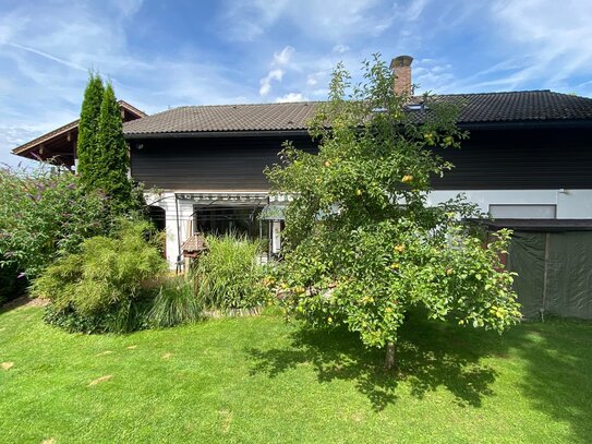 Partenkirchen: Vermietete 4-Zimmer-Erdgeschosswohnung mit großem Garten und Terrassen