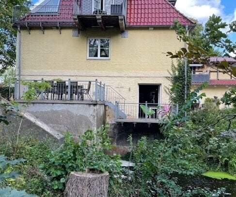 Sülfeld, Eigentumswohnung mit Terrasse am kleinen Wasserlauf in historischer Wassermühle von 1790