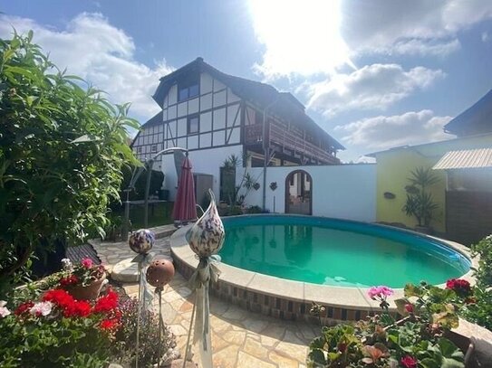 Mehrfamilienhaus mit Ausbaureserven -und Gartengrundstück