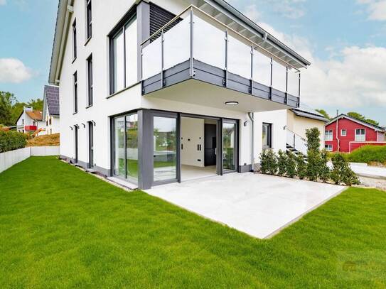 Wohnen im Luxus-Neubau! Erstbezug - 4 Zimmerwohnung mit Terrasse und großem Garten