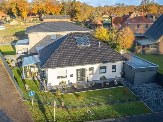 Hochwertiger, top gepflegter Bungalow mit Glassommergarten und Carport mit elektrischen Rolltoren!