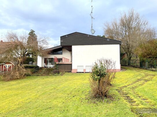 Einfamilienhaus mit Einliegerwohnung und großem Garten!