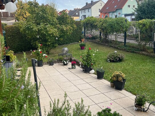 Charmante und familienfreundliche 3-Zimmer-Wohnung mit kleinem Gartenparadies