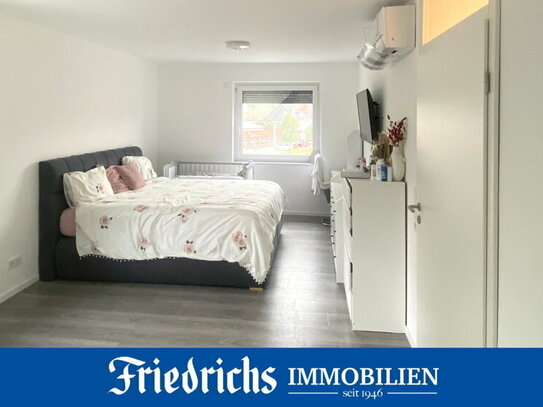 Modernisierte 3-Zimmer-Wohnung in einem Wohn- und Geschäftshaus im 2. Obergeschoss in Rostrup-BZ