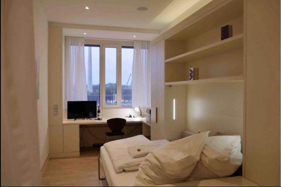 Stilvolles Miniapartment mit Concierge-Service und Fitnessbereich im Herzen der Stadt