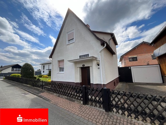 Schickes kleines Einfamilienhaus mit Garten, Garage und Nebengebäude