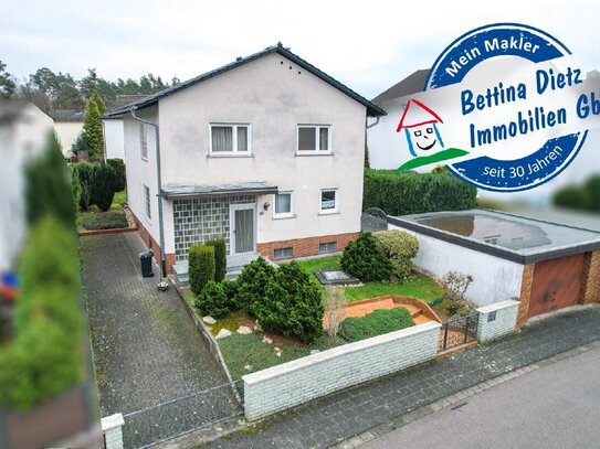 DIETZ: TOP geschnittenes Einfamilienhaus mit Keller, Garten und Garage in TOP Randlage von Babenhausen!