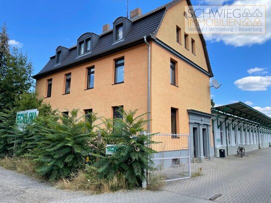 Mehrfamilienhaus und Gewerbehalle in sehr guter Lage