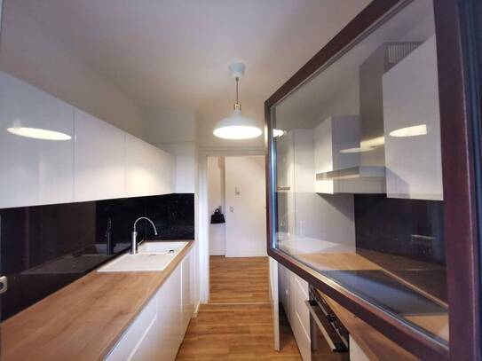 Schöne 2-Zimmer-Wohnung mit Garten und Tiefgaragenstellplatz in Uni-Nähe