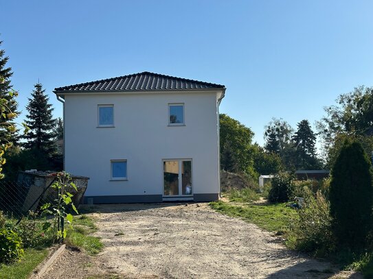 Verkauf Grundstück mit Haus als geschlossener Rohbau