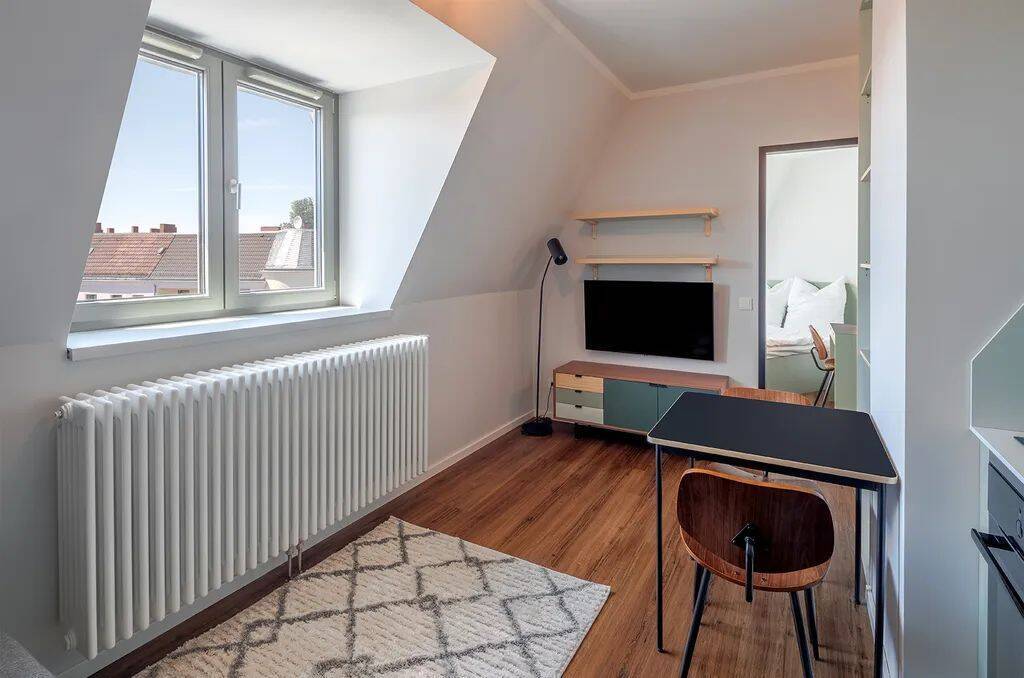 Gemütliche unbefristete 2-Zimmer-Wohnung mit offenem Wohnbereich im RIX Neukölln - Foto 1