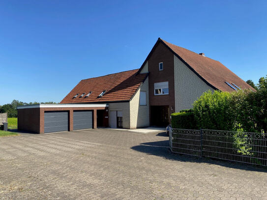 Ländliches Wohnen mit Weitblick! Großzügiges Dreifamilienhaus in Bünde-Dünne!