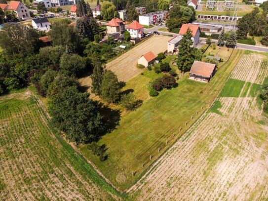 Baugrundstück mit positiven Bauvorbescheid und Garage für Wohnwagen