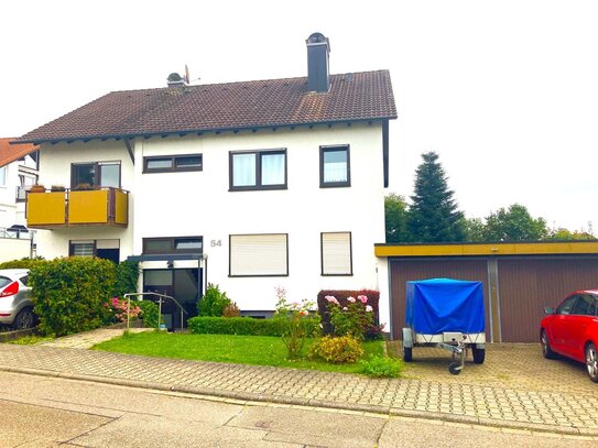 3- Zimmer Wohnung mit Balkon, Terrasse und Garten