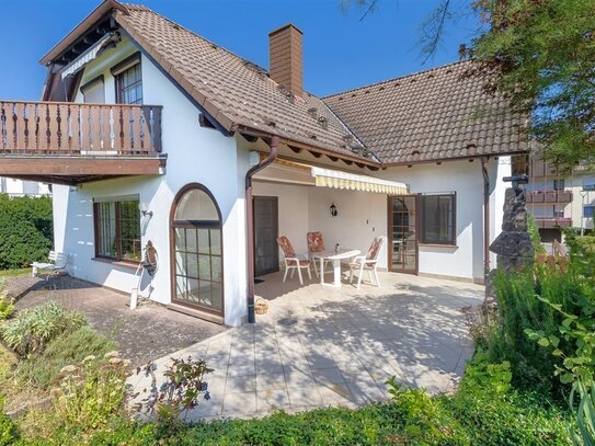 Leben auf einer Ebene! Winkelbungalow mit ausgebautem Dachgeschoss in Top-Wohnlage