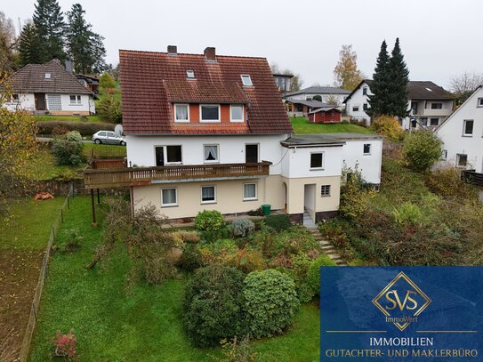 Mehrfamilienhaus mit Entwicklungspotential in ruhiger Lage von Oberkaufungen mit Garage und großem Garten.