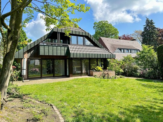 Moderne Eleganz und Grünoase mitten in Kleve: Einfamilienhaus mit großzügiger Fensterfront und traumhaften Garten