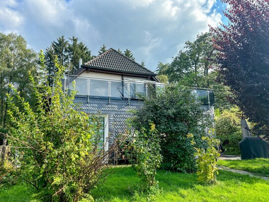 Rarität für echte Naturliebhaber: Einfamilienhaus mit schönem Gartengrundstück und Dachterrasse