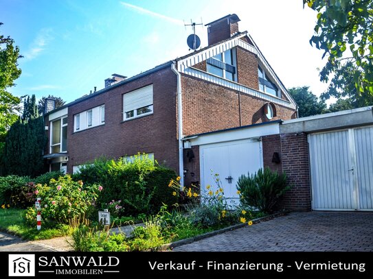 Gepflegtes Wohnhaus mit Garten, Garage und Balkon in begehrter Lage