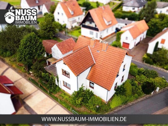 Familienfreundliches Einfamilienhaus mit großem Garten und Garage