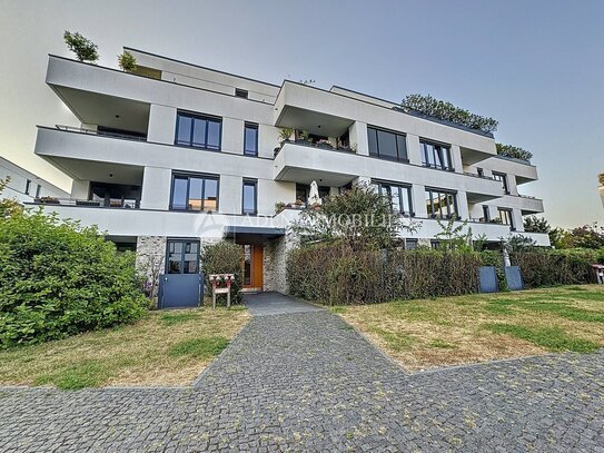 Moderne Neubauwohnung mit Blick aufs Wasser