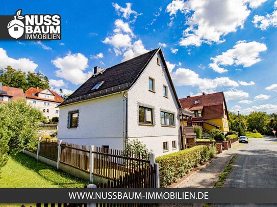 Perfektes Familienhaus mit Garage und Nebengelass in traumhafter Lage