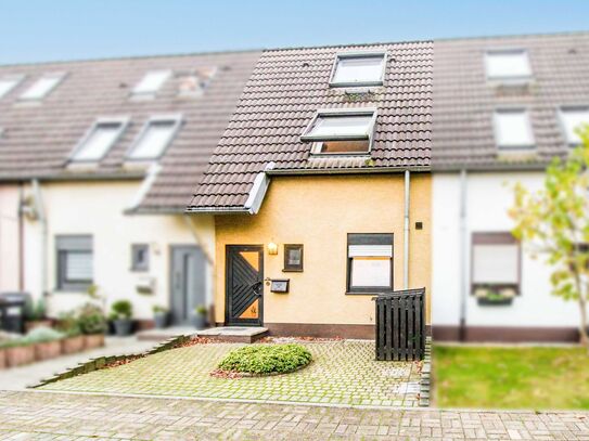 Ihr zukünftiges Zuhause: Gepflegtes Reihenmittelhaus mit Garten, Garage und Freistellplatz