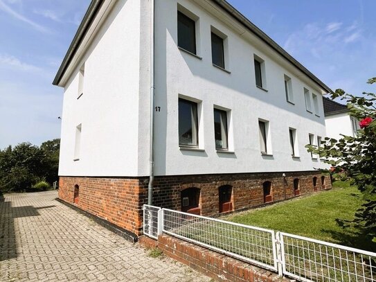 Mehrfamilienhaus mit Bauland in toller Lage von Ehmen!