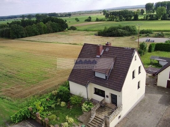 Attraktives Einfamilienhaus in ruhiger Feldrandlage auf eigenem Grundstück