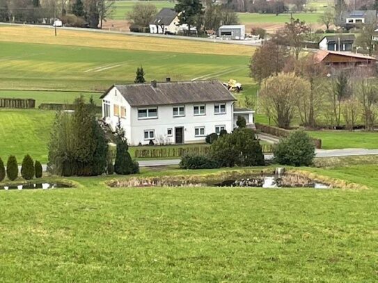 Einfamilienhaus mit Einliegerwohnung (auch nur als Einfamilienhaus nutzbar) in landschaftlich reizvoller Alleinlage am…