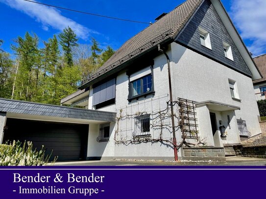 Einfamilienhaus mit Erweiterungsbau, Garage und großem Garten!