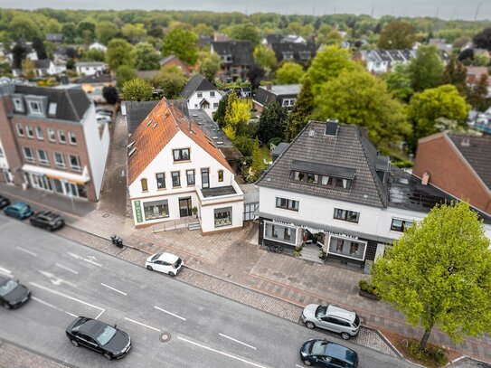 Leherheide // Renditestarkes Ensemble aus Wohn- und Geschäftshäusern in unmittelbarer Nähe zum Park