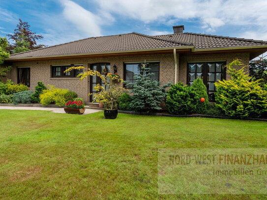 Gepflegter ebenerdiger Bungalow nebst massiver Garage und Werkstatt/Geräteraum