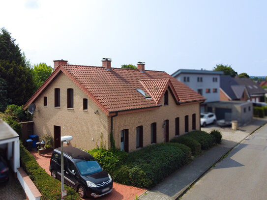 Top Lage mit flexiblen Möglichkeiten! *Wohnhaus + großes Baugrundstück in Ibbenbüren*