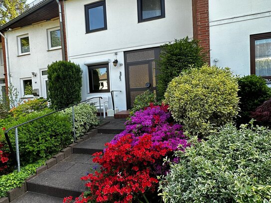 Reihenhaus mit Süd-West Garten + Einzelgarage in Norderstedt-Garstedt.