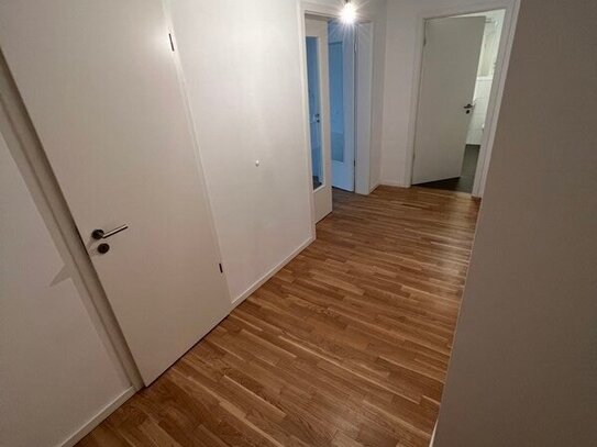 Moderne 3-Zimmer-Wohnung mit Wintergarten, offener Wohnküche und Fußbodenheizung - ca. 90 m² Wohnkomfort