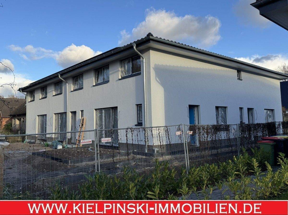 Neubau in Niendorf: 2-Zimmer-ETW im Effizienzhaus 55 mit Terrasse und eigenem Garten