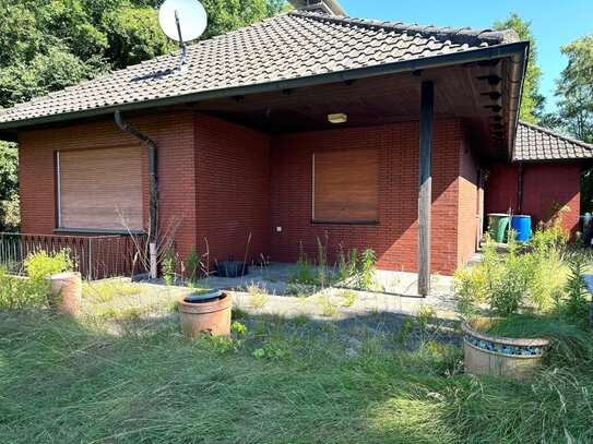 Bungalow mit Vollkeller, zwei Stellplätzen und einem ca. 1100qm großen Kaufgrundstück in Lünen-Alstedde