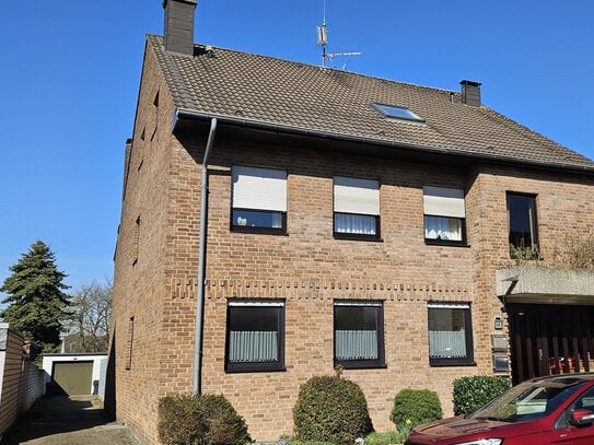 Eigentumswohnung mit Loggia, Garten und Garage