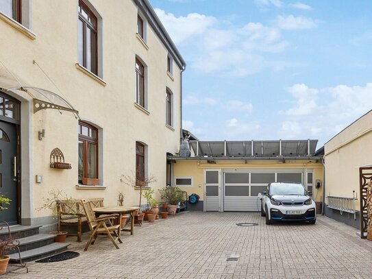 Gerresheimer Immobiliengelegenheit: Mehrfamilienhaus mit Halle und Haus im Innenhof