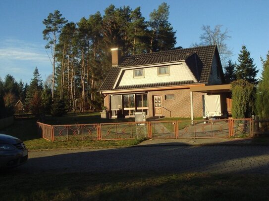 Ferienhaus mit Wintergarten, ausgebautem Dachgeschoss, Carport mit Nebenraum, Keller, überdachtem Holzlager auf 3292 qm…