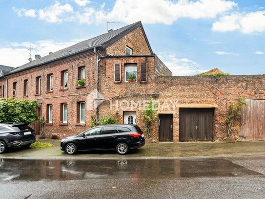 Teilvermietetes Mehrfamilienhaus mit 3 WE, sonniger Terrasse und Ausbaupotenzial in ruhiger Lage