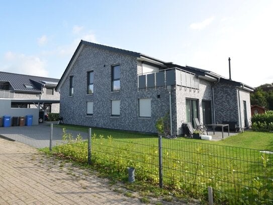 Neubau in Brake: ETW mit Terrasse und Carport, PROVISIONSFREI