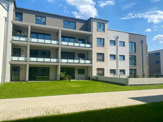 Familienwohnung! Neubau mit Fernwärme: 3,5 Zi.- mit Gartenstück/ oder Balkon