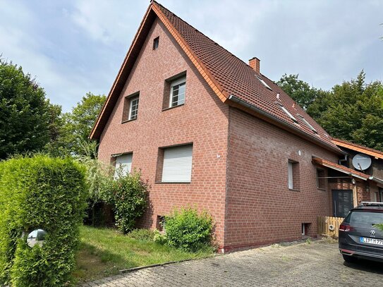 Teilsanierte Erdgeschosswohnung mit Garage und Gartennutzung in guter Lage